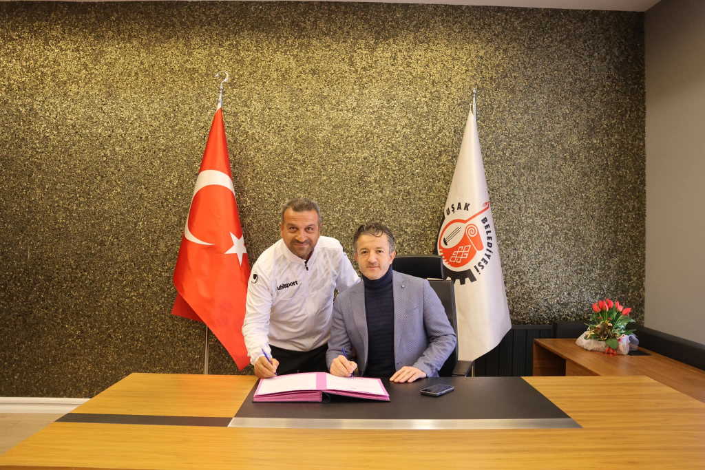 hikmet-karaman-imza.jpg
